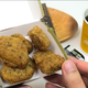hand holding spicy mcnuggets